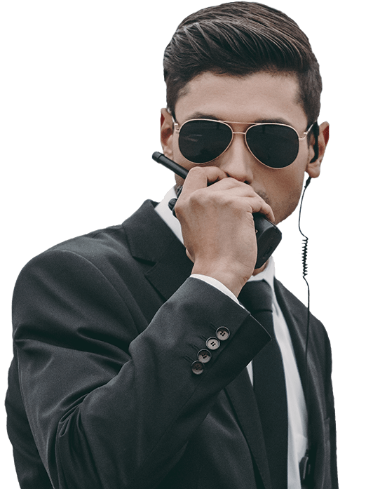 handsome bodyguard in sunglasses talking by portab 2022 12 16 16 34 29 utc 2